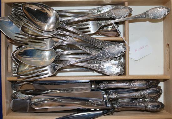 Twenty five items of German 800 flatware and twelve knives.